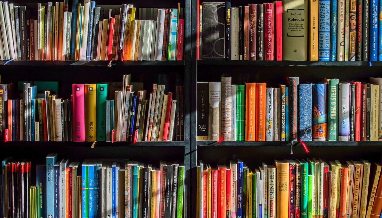 A shelf filled with books.