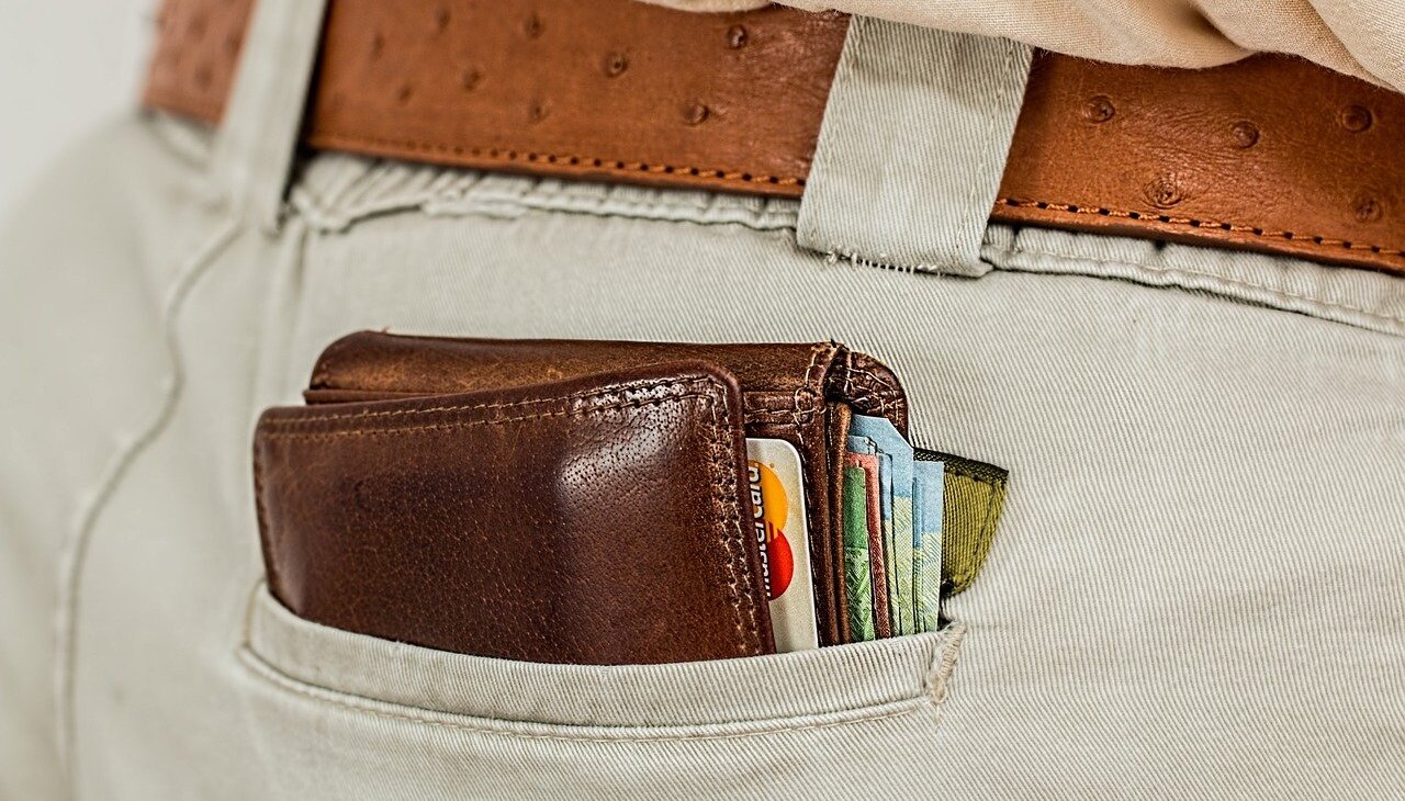 A man with a wallet on his pocket.