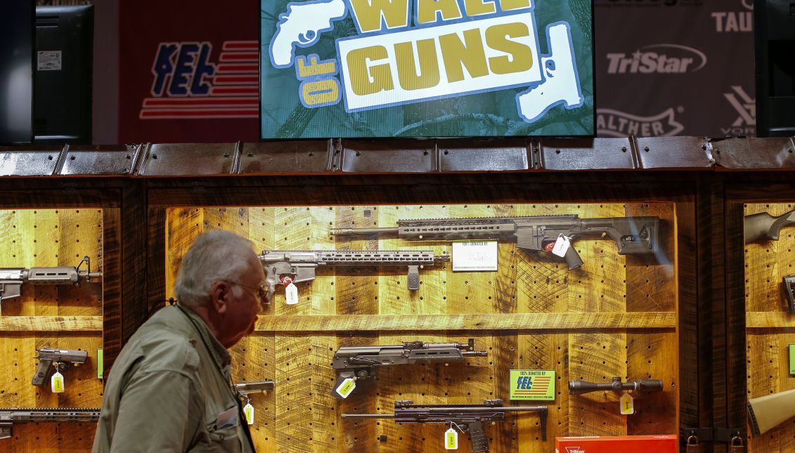 A man looks at a firearms exhibit at the National Rifle Association's Annual Meetings at the Georgia World Congress Center in Atlanta, Georgia, USA, 27 April 2017. EPA/ERIK S. LESSER
