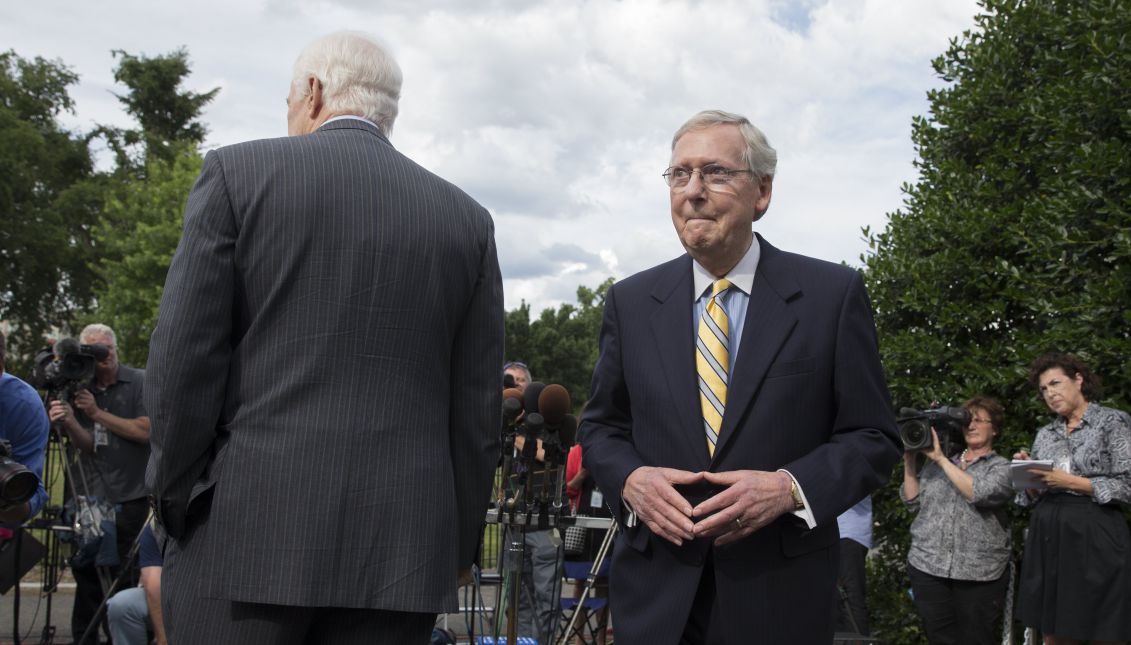 Senate Majority Leader Republican Mitch McConnell (R) turns away from the microphones beside Republican Senator from Texas John Cornyn (L) after speaking to members of the news media outside the West Wing of the White House following a meeting to discuss healthcare legislation with Senate Republicans and US President Donald J. Trump, in Washington, DC, USA, 27 June 2017. EPA/MICHAEL REYNOLDS
