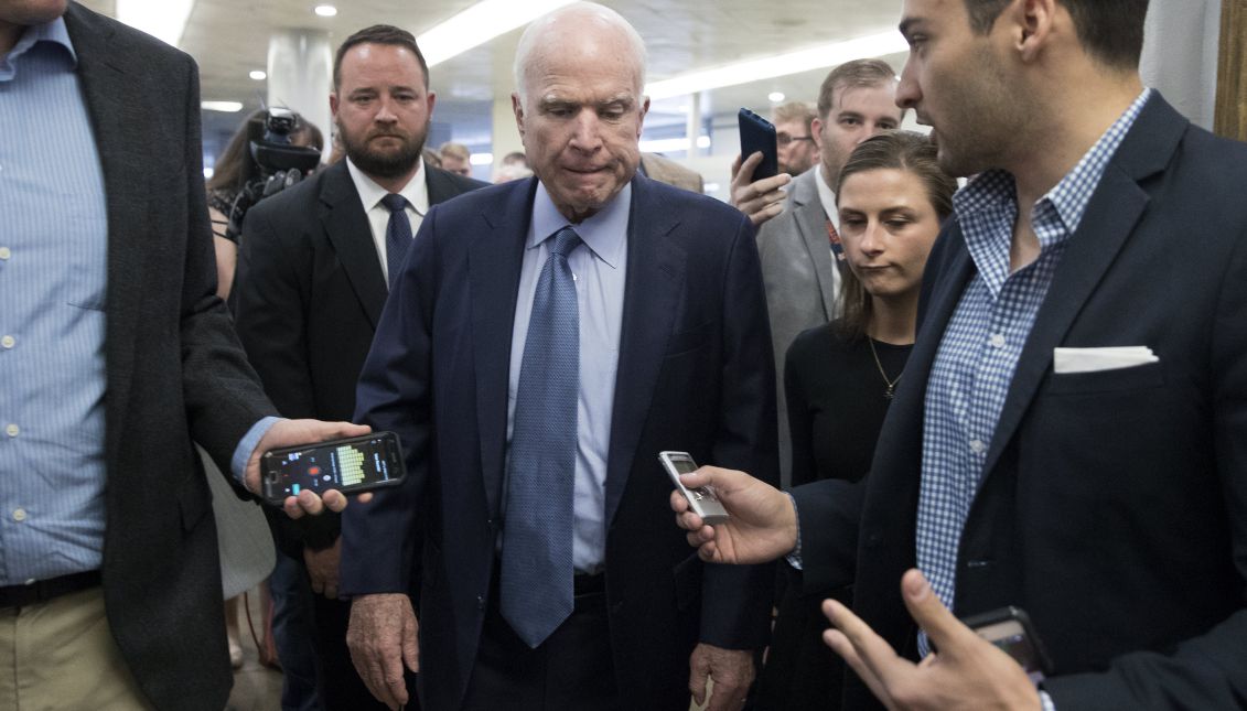 Republican Senator from Arizona John McCain (C) is followed by members of the news media near the Senate subway before votes on Capitol Hill in Washington, DC, USA, Oct. 19, 2017. EPA-EFE/MICHAEL REYNOLDS