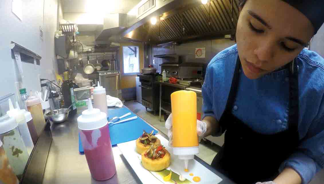 Merliz Gomez is the chef of the Venezuelan restaurant Tartarepería 18.64, located in Fishtown. Photos: Eli Siegel.
 
