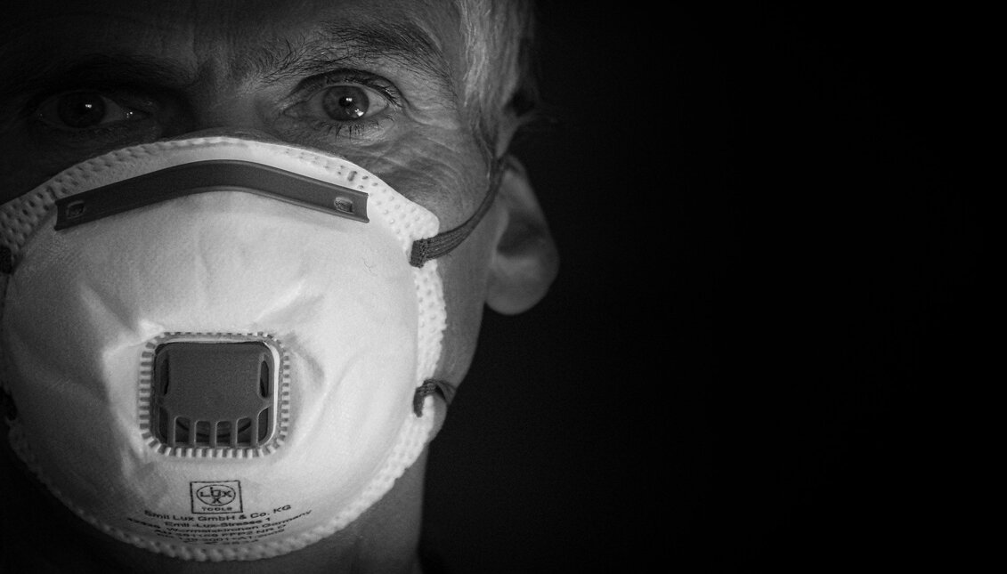 Older adult wearing face masks to protect themselves from Covid-19