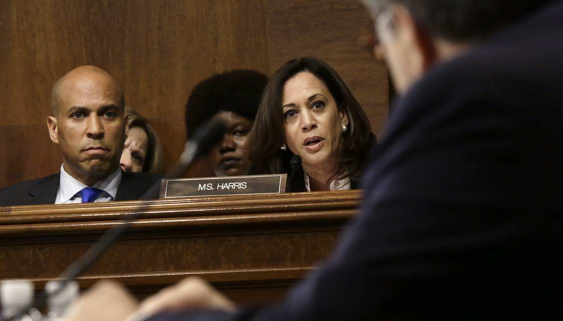 WASHINGTON, DC - MAY 1: U.S. Sen. Kamala Harris (D-CA) speaks and Sen. Cory Booker (D-NJ) listens as U.S. Attorney General William Barr testifies before the Senate Judiciary Committee May 1, 2019, in Washington, DC. (Photo by Alex Wong/Getty Images)