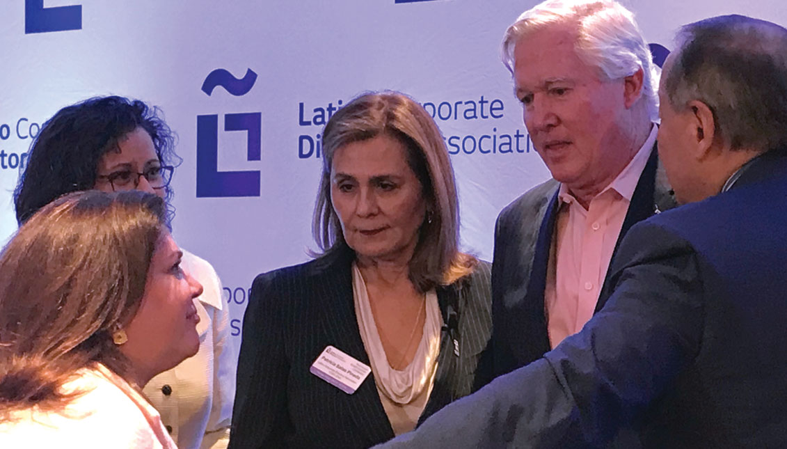 Kim Casiano, Board member of Ford Company (left) being introduced by Nelson Diaz (right), PECO Board member, to the President and CEO of EXELON, Christopher Crane. Photo: AL DÍA News