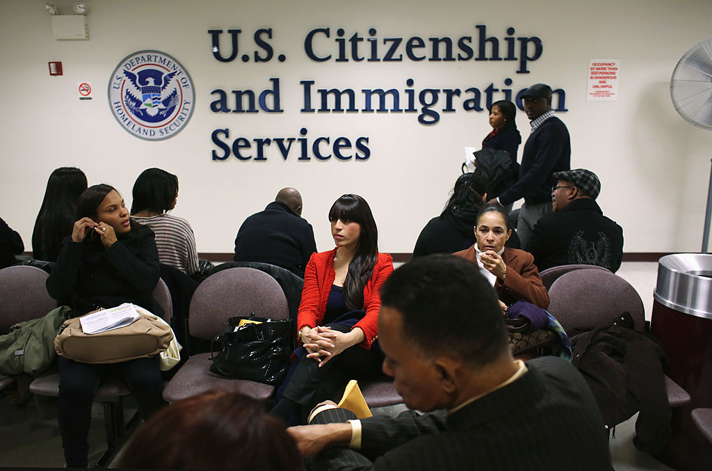 JANUARY 29: Immigrants wait for their citizenship interviews at the U.S. Citizenship and Immigration Services (USCIS), district office on January 29, 2013 in New York City. Some 118,000 immigrants applied for U.S. citizenship in the New York City dictrict in 2012. (Photo by John Moore/Getty Images)