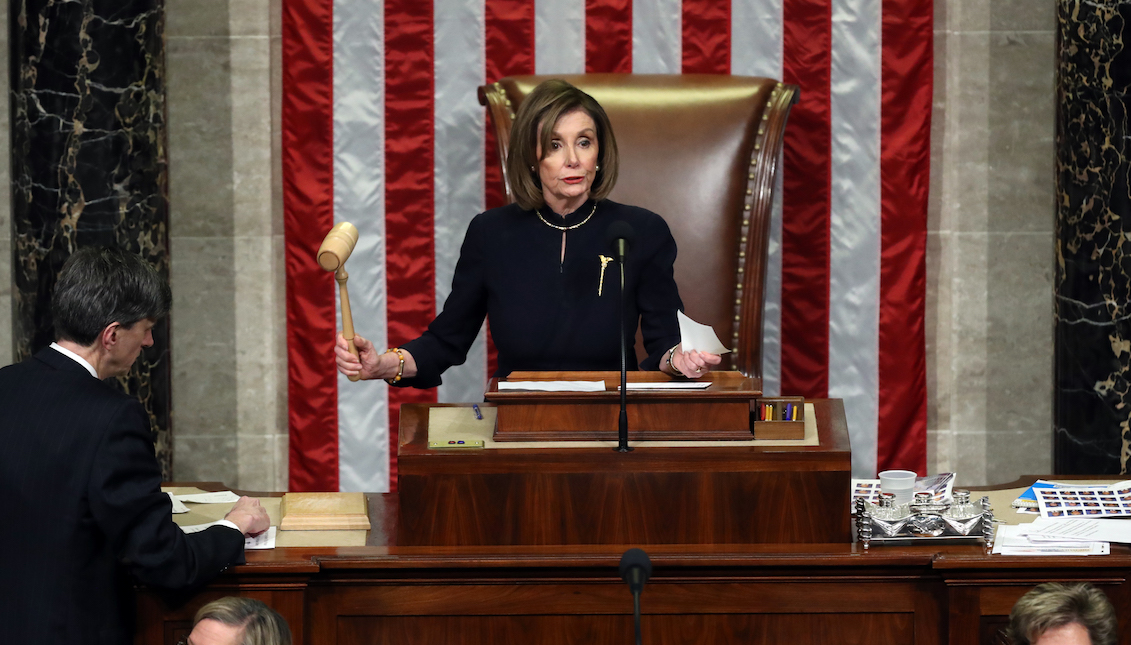WASHINGTON, DC - DECEMBER 18: Speaker of the House Nancy Pelosi (D-CA) presides over Resolution 755 as the House of Representatives votes on the second article of impeachment of US President Donald Trump at in the House Chamber at the US Capitol Building on December 18, 2019 in Washington, DC. (Photo by Chip Somodevilla/Getty Images)