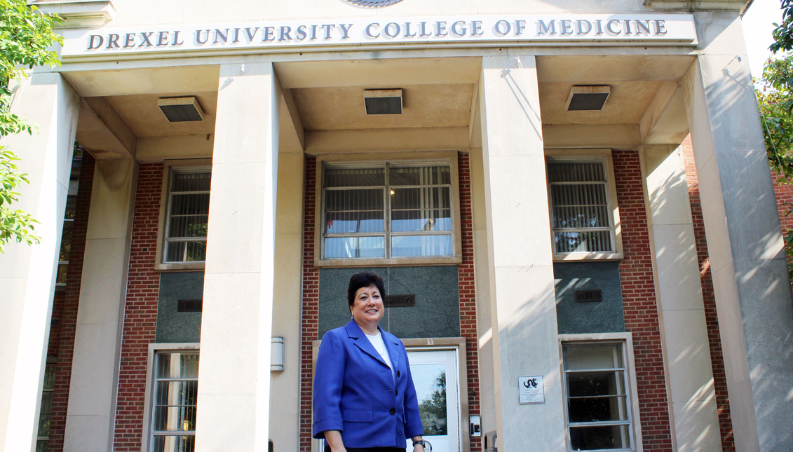 Dr. Ana Núñez stands outside of Drexel College of Medicine in East Falls, PA, where she is the associate dean of diversity, equity and inclusion. Photo: Emily Neil / AL DÍA News