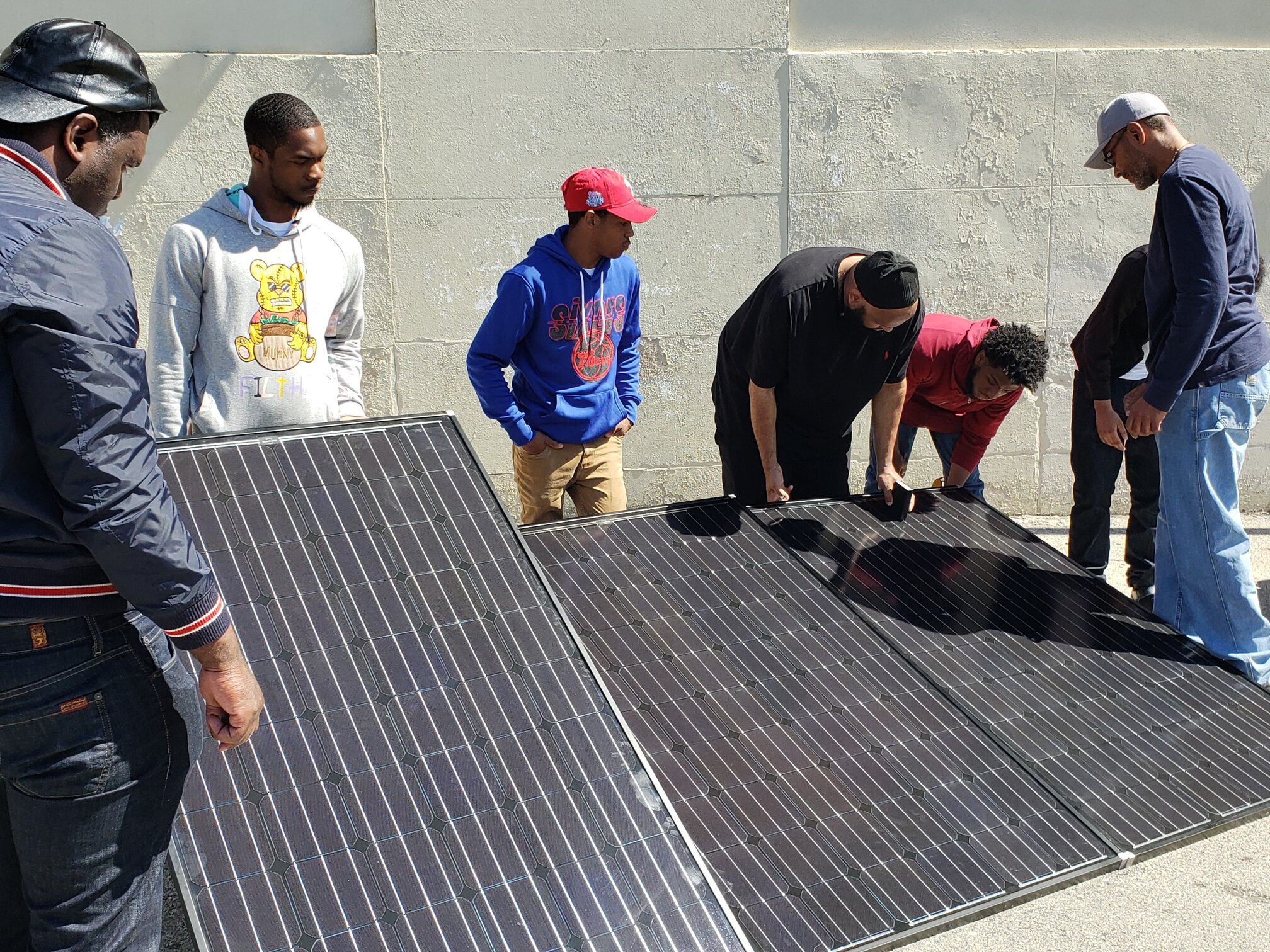  Working with solar panels at the workforce development program in 2019. Photo Courtesy of PECO. 