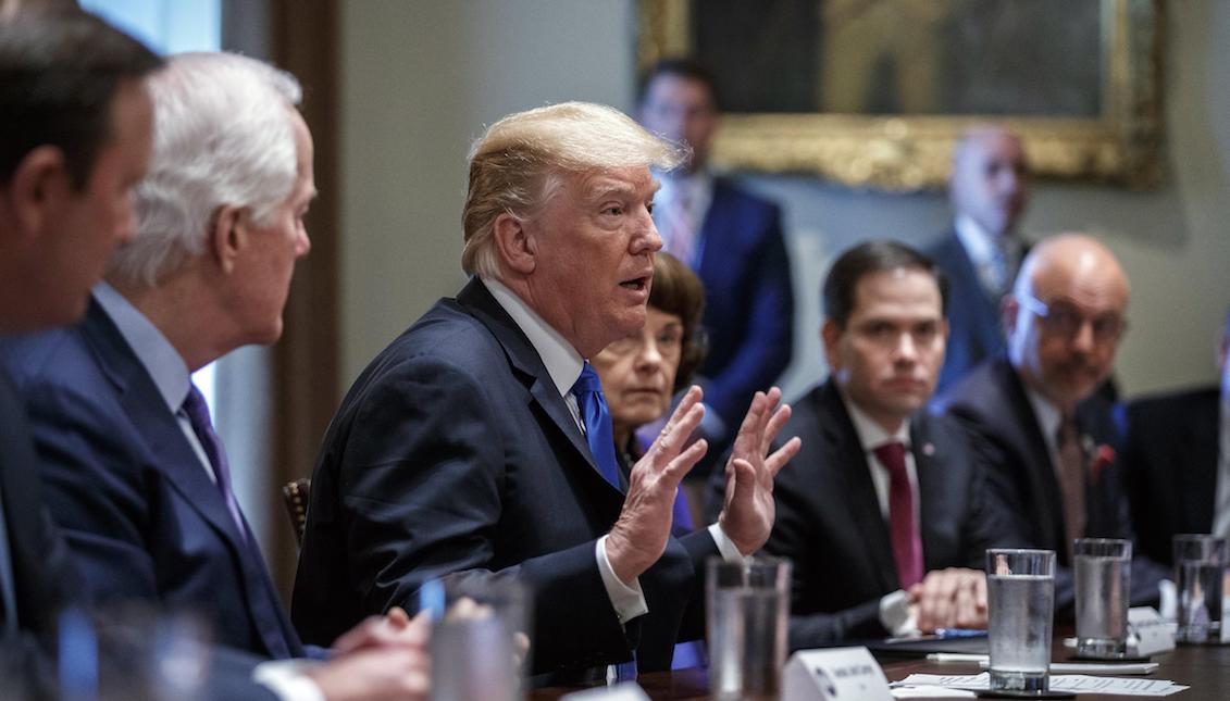 US President Donald Trump (c) speaks during a meeting with members of Congress to discuss school and community safety at the White House in Washington (United States) on Wednesday, February 28, 2018. EFE / SHAWN THEW