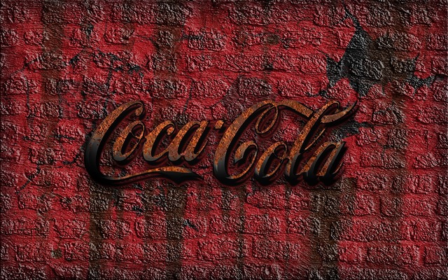 Coca Cola sign on a brick wall