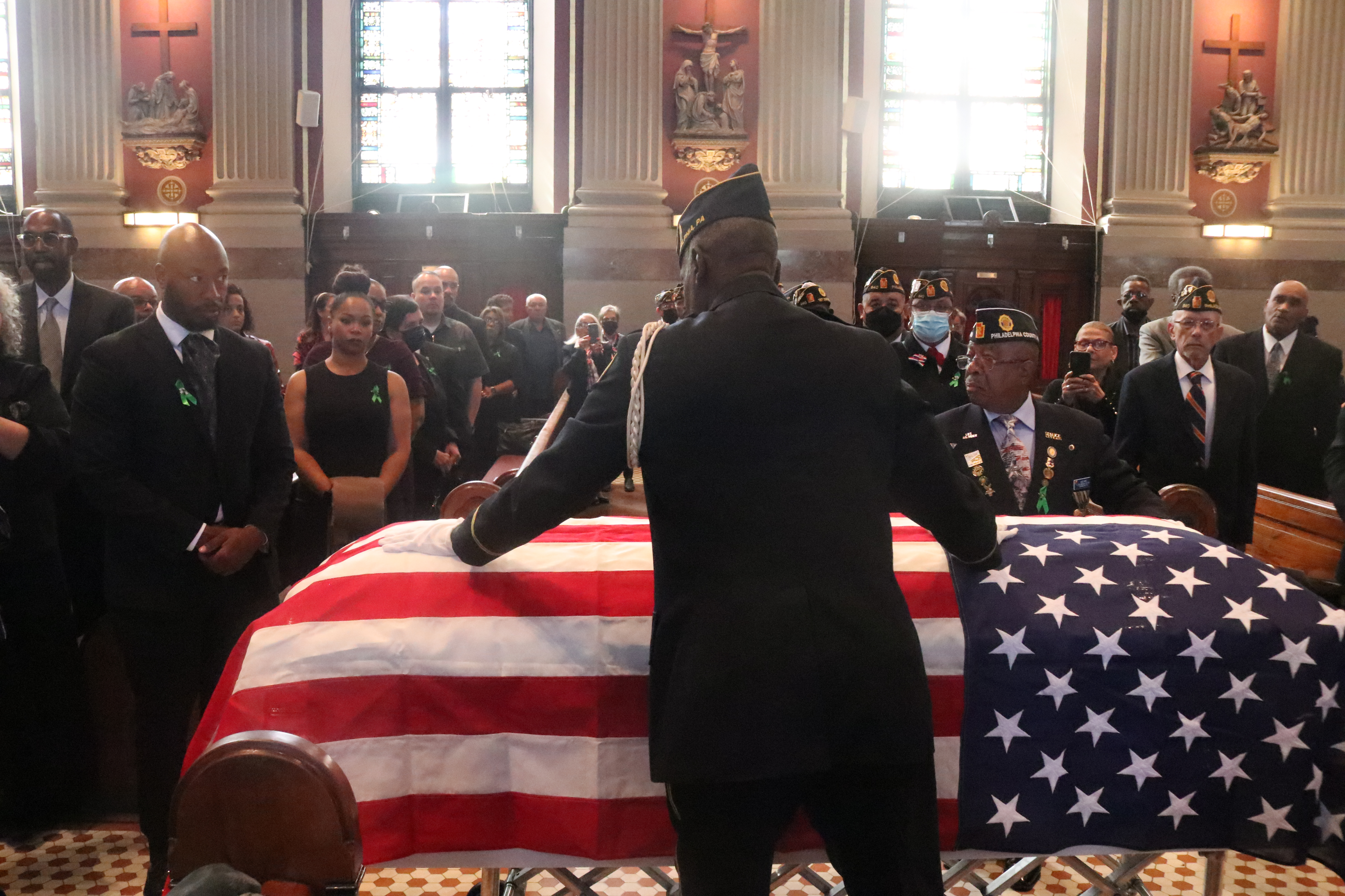 Pictured: Jesse Bermudez' casket enveloped in a U.S. flag.