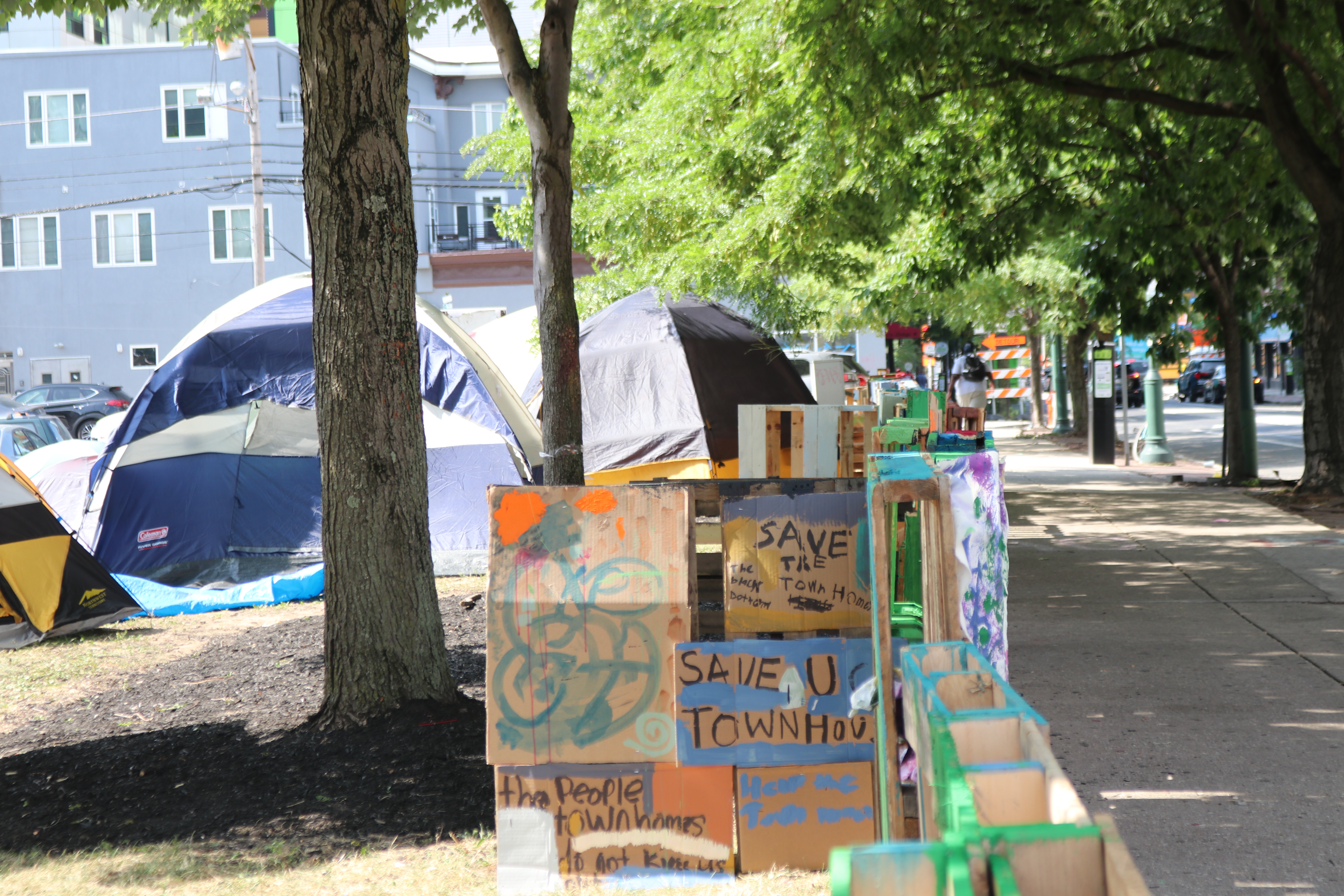 Pictured: Tents were set up in the UC Townhomes courtyard in protest of the sale.