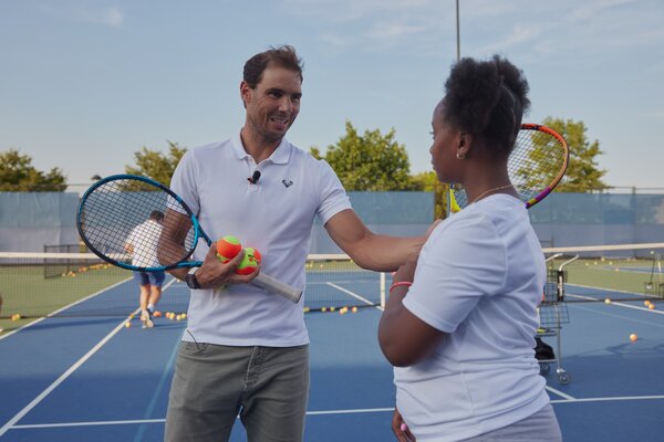 Rafael Nadal talking to a young student in New York. Photo: @CityYear.
